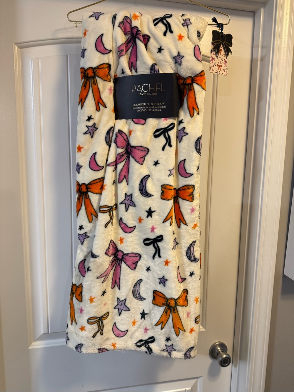 RACHEL Rachel Roy White Plush Throw with Pink and Orange Bows